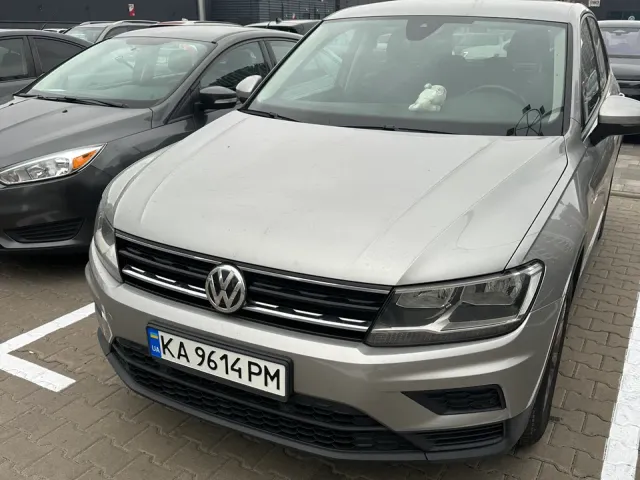 Volkswagen Tiguan - фото 1