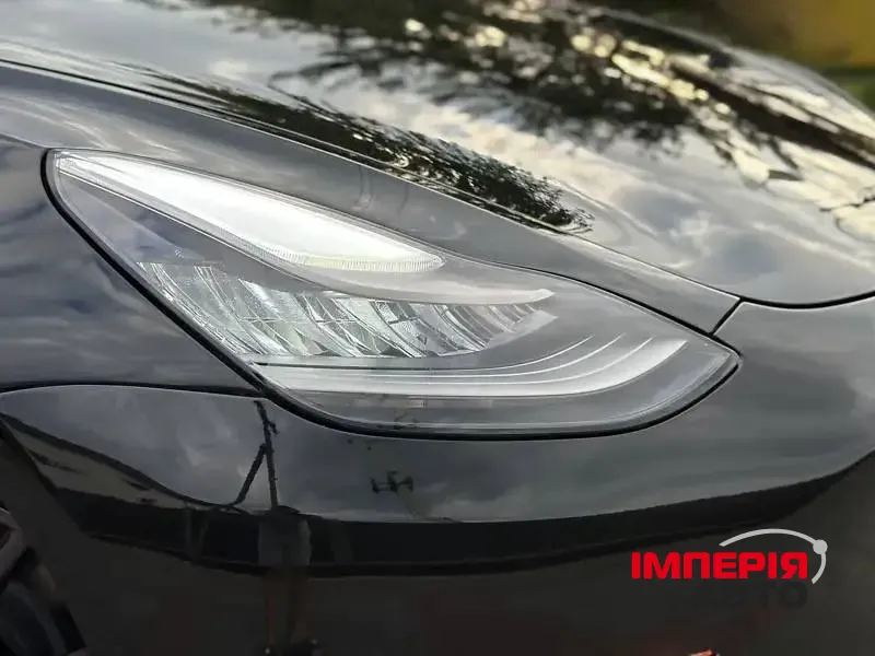 Tesla Model 3 - фото 11