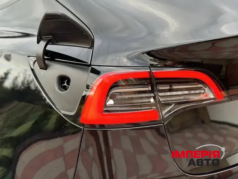 Tesla Model 3 - фото 10