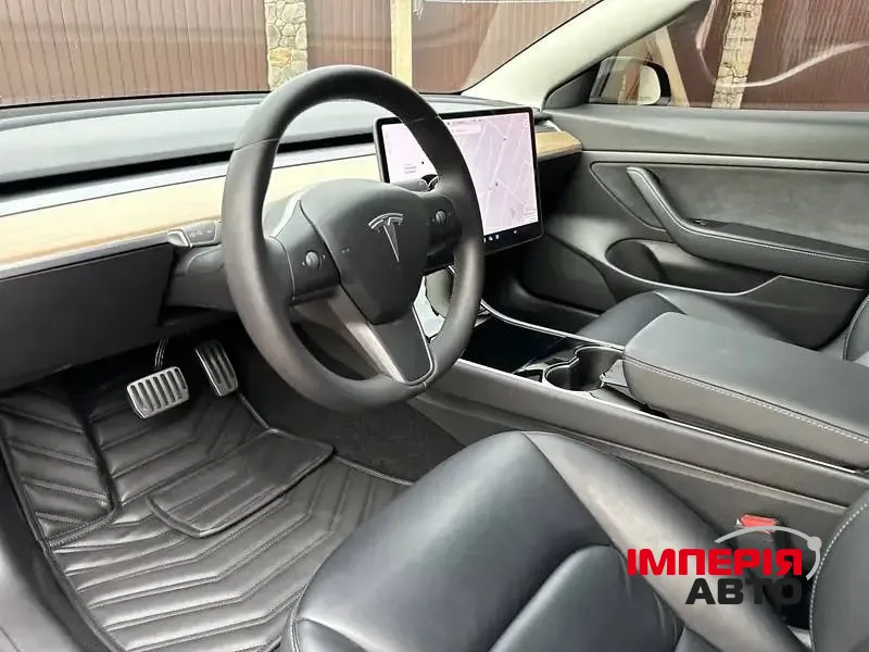 Tesla Model 3 - фото 7