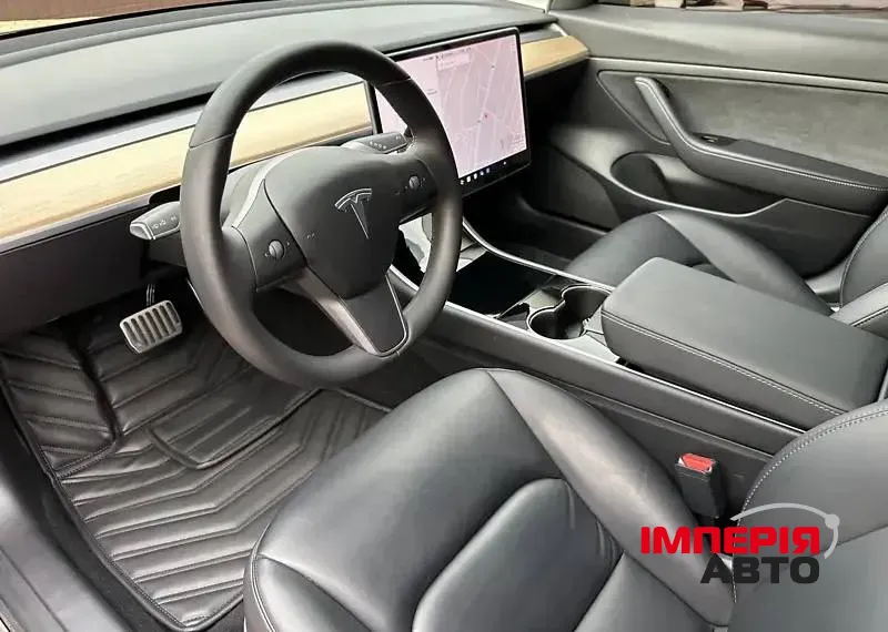 Tesla Model 3 - фото 8