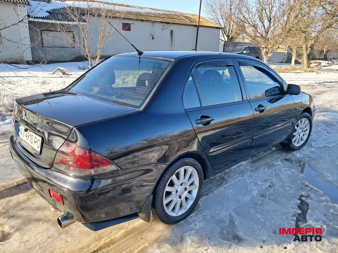 Mitsubishi Lancer - фото 3