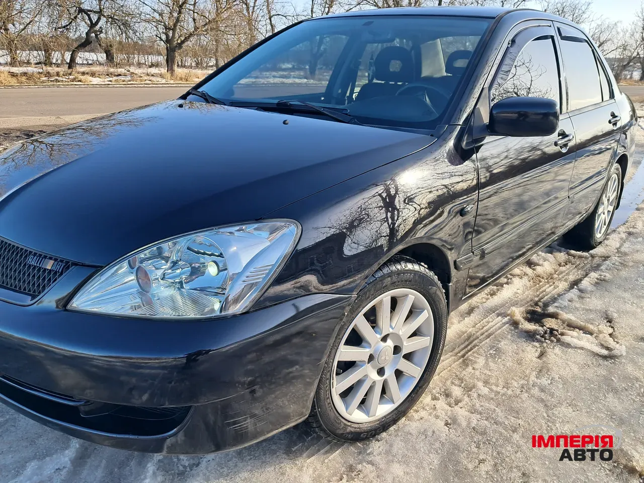 Mitsubishi Lancer - фото 6