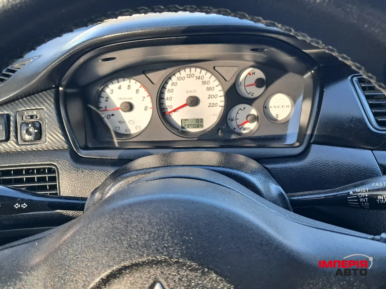 Mitsubishi Lancer - фото 13