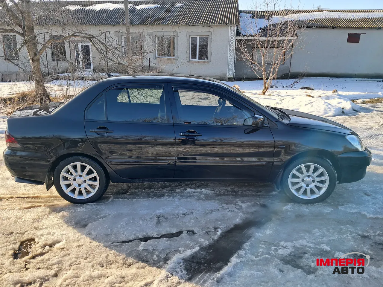 Mitsubishi Lancer - фото 11