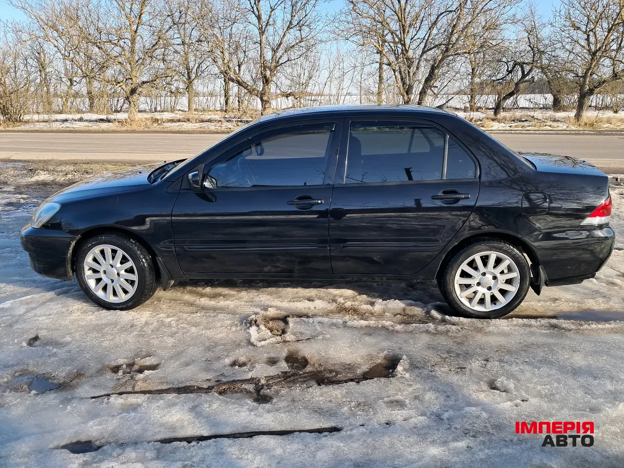 Mitsubishi Lancer - фото 8