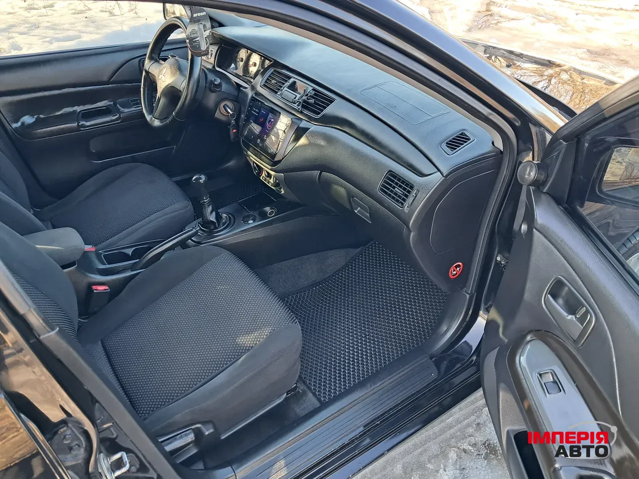 Mitsubishi Lancer - фото 15