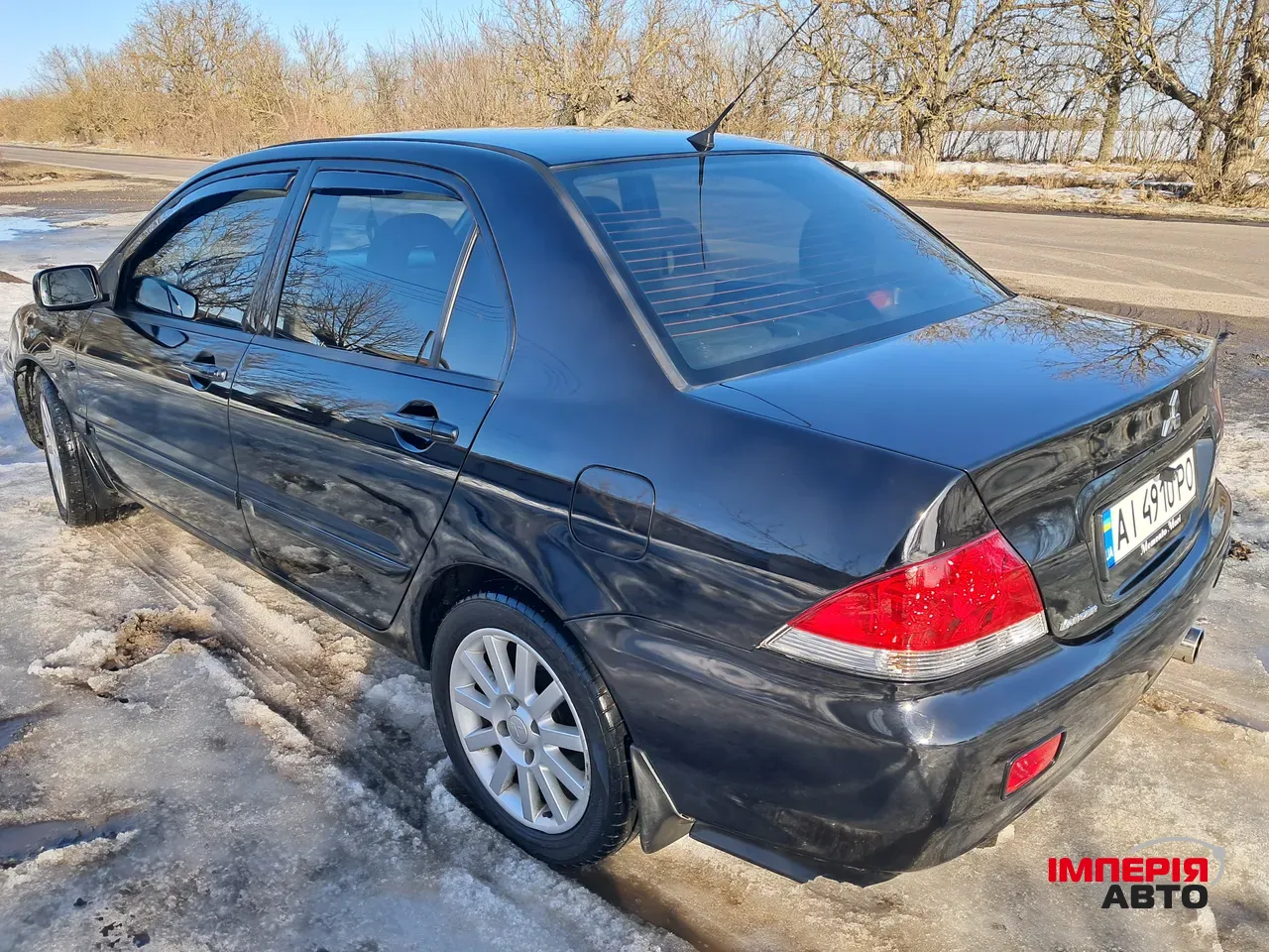 Mitsubishi Lancer - фото 9