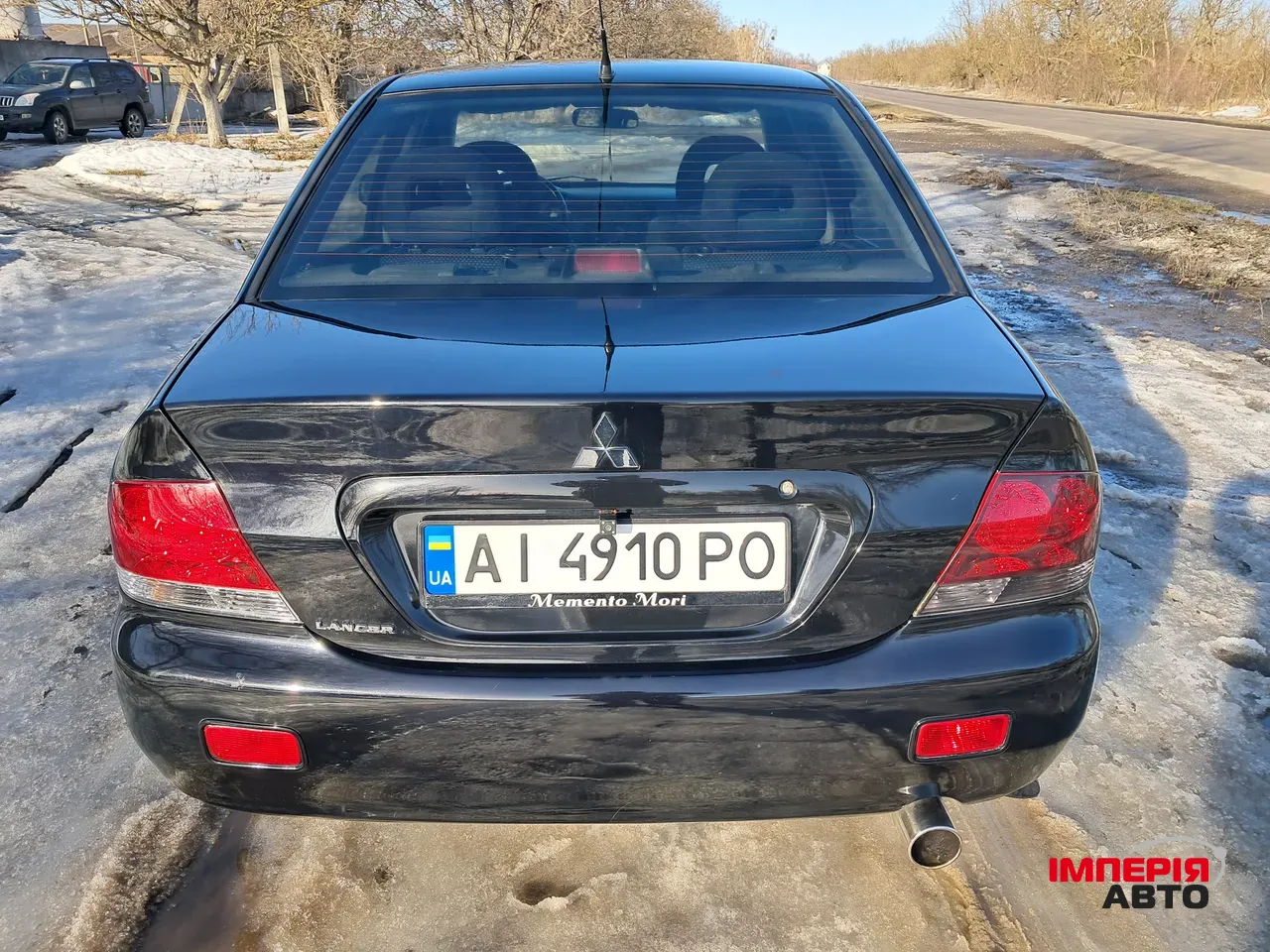 Mitsubishi Lancer - фото 10