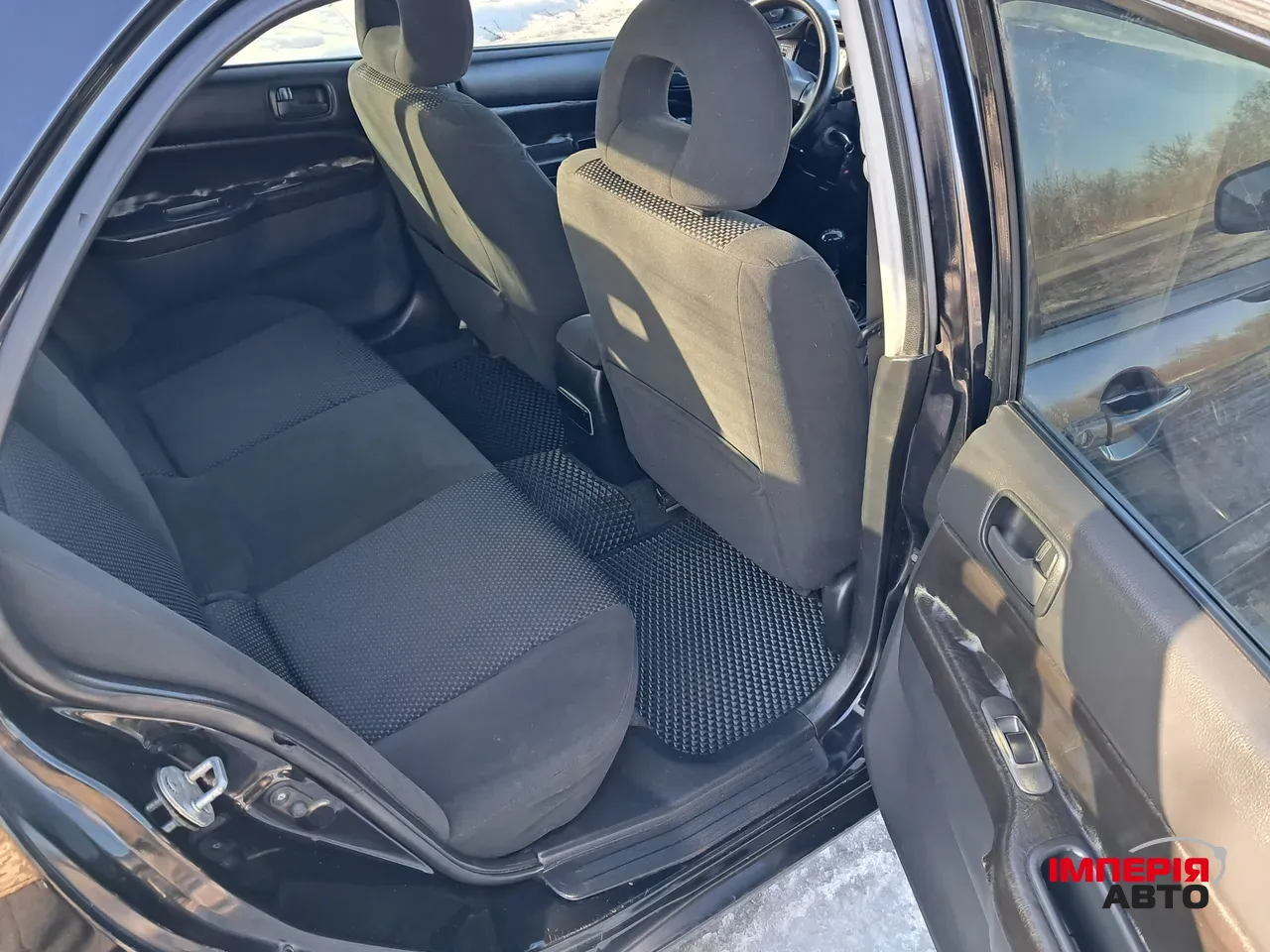 Mitsubishi Lancer - фото 16