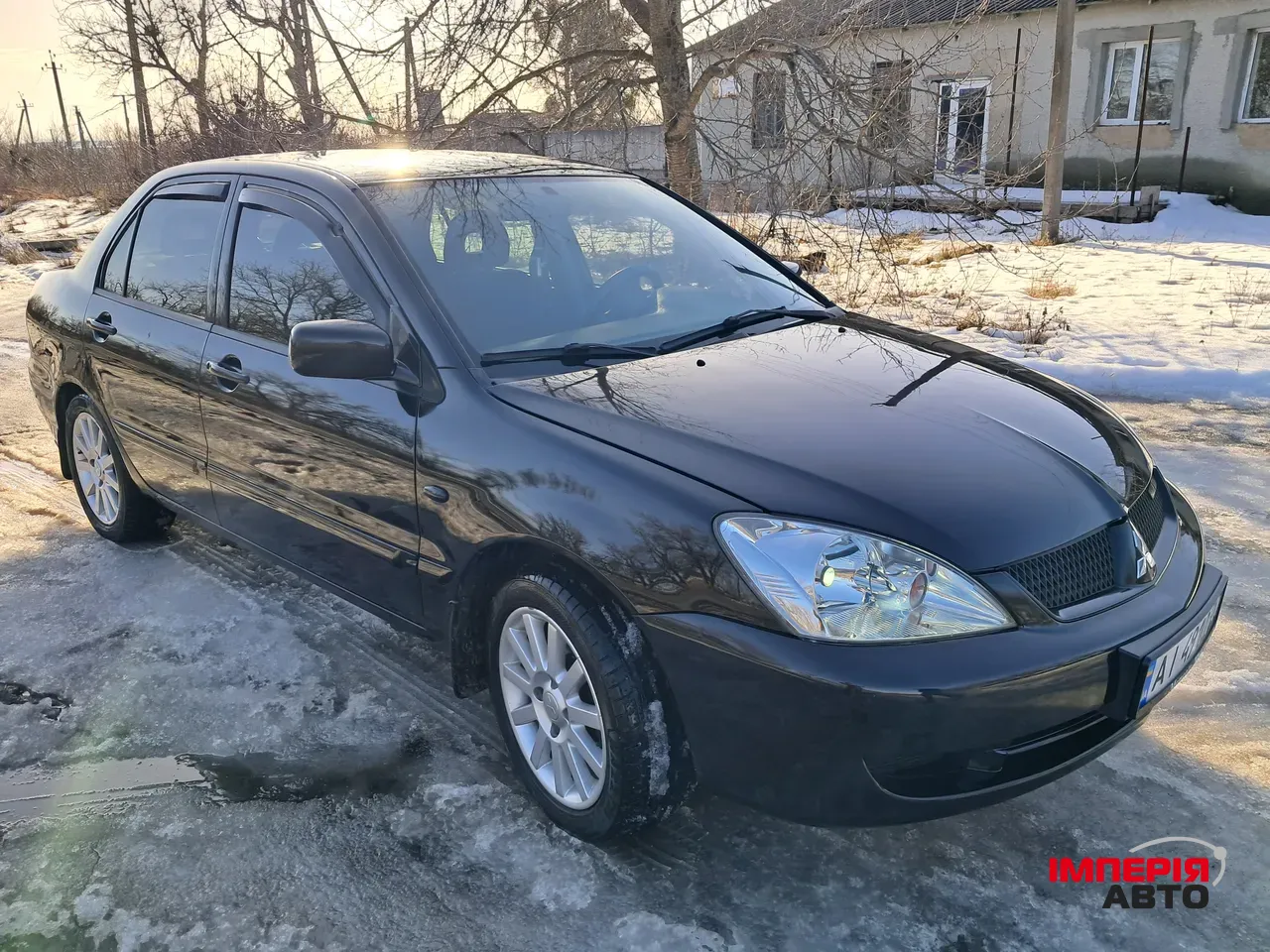 Mitsubishi Lancer - фото 2