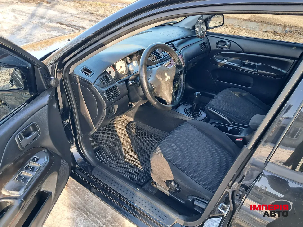 Mitsubishi Lancer - фото 18