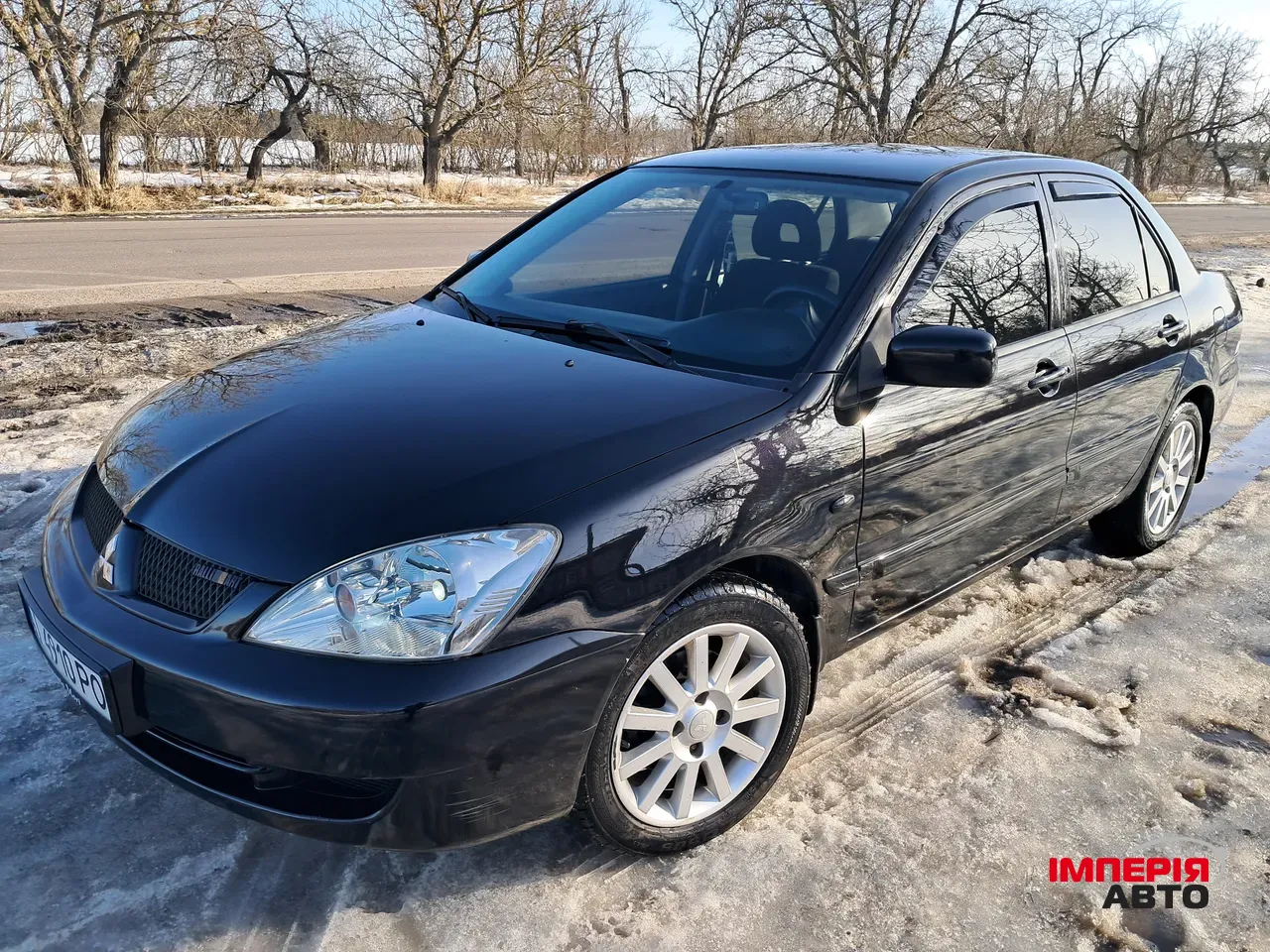 Mitsubishi Lancer - фото 1