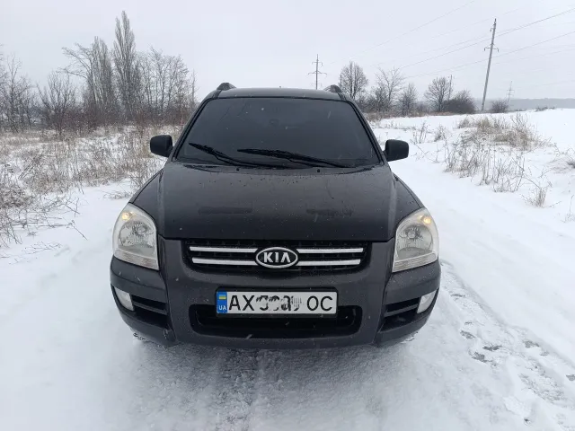 Kia Sportage - фото 1
