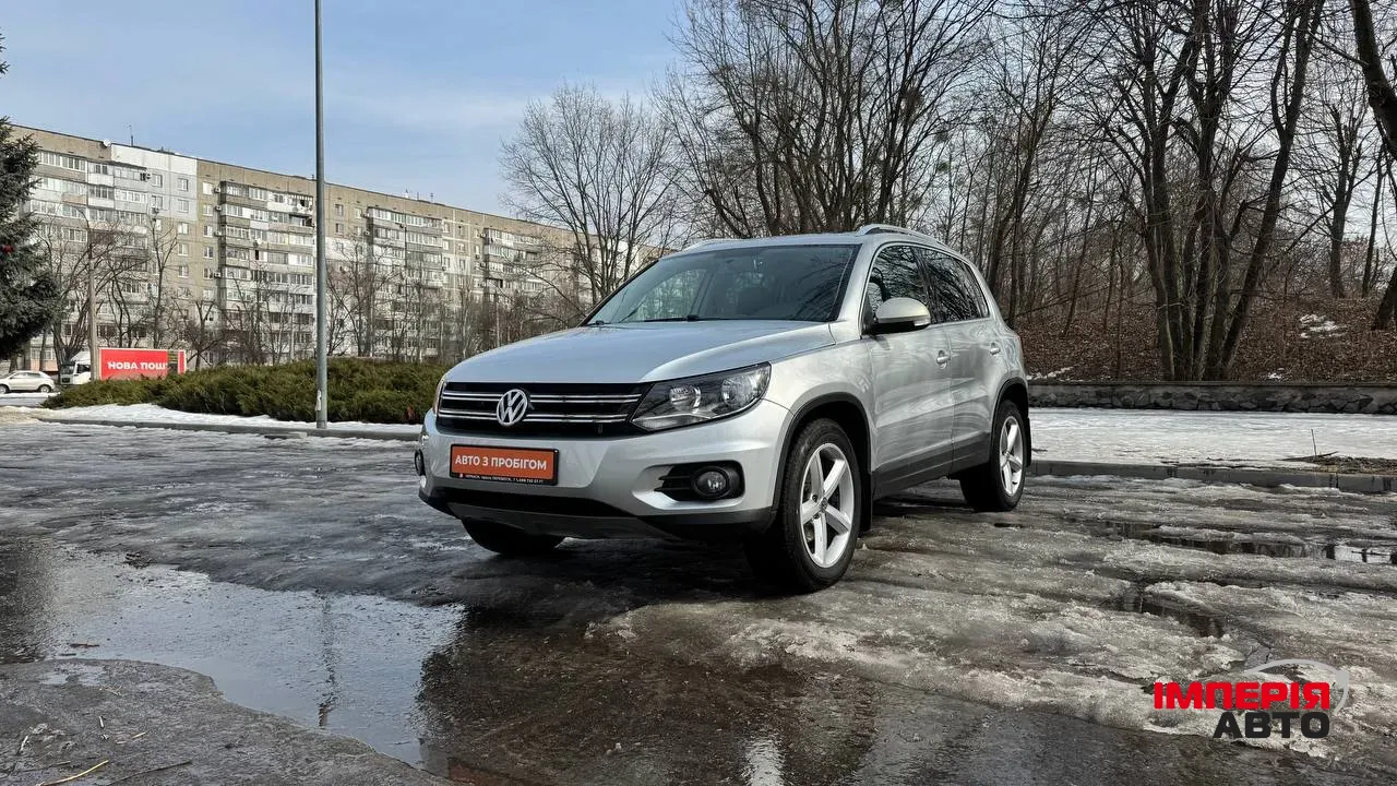 Volkswagen Tiguan - фото 1