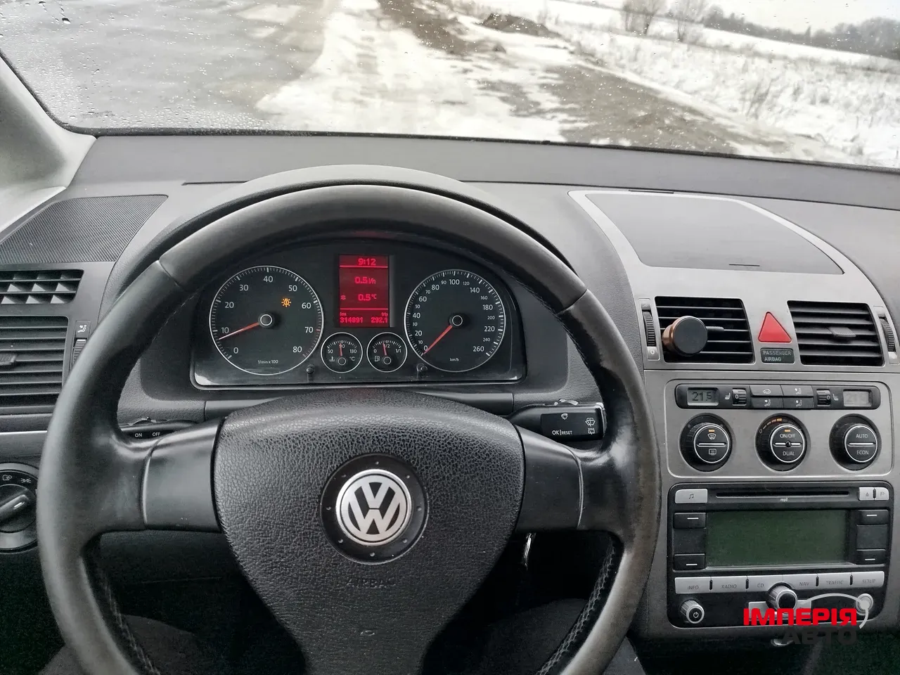 Volkswagen Touran - фото 9