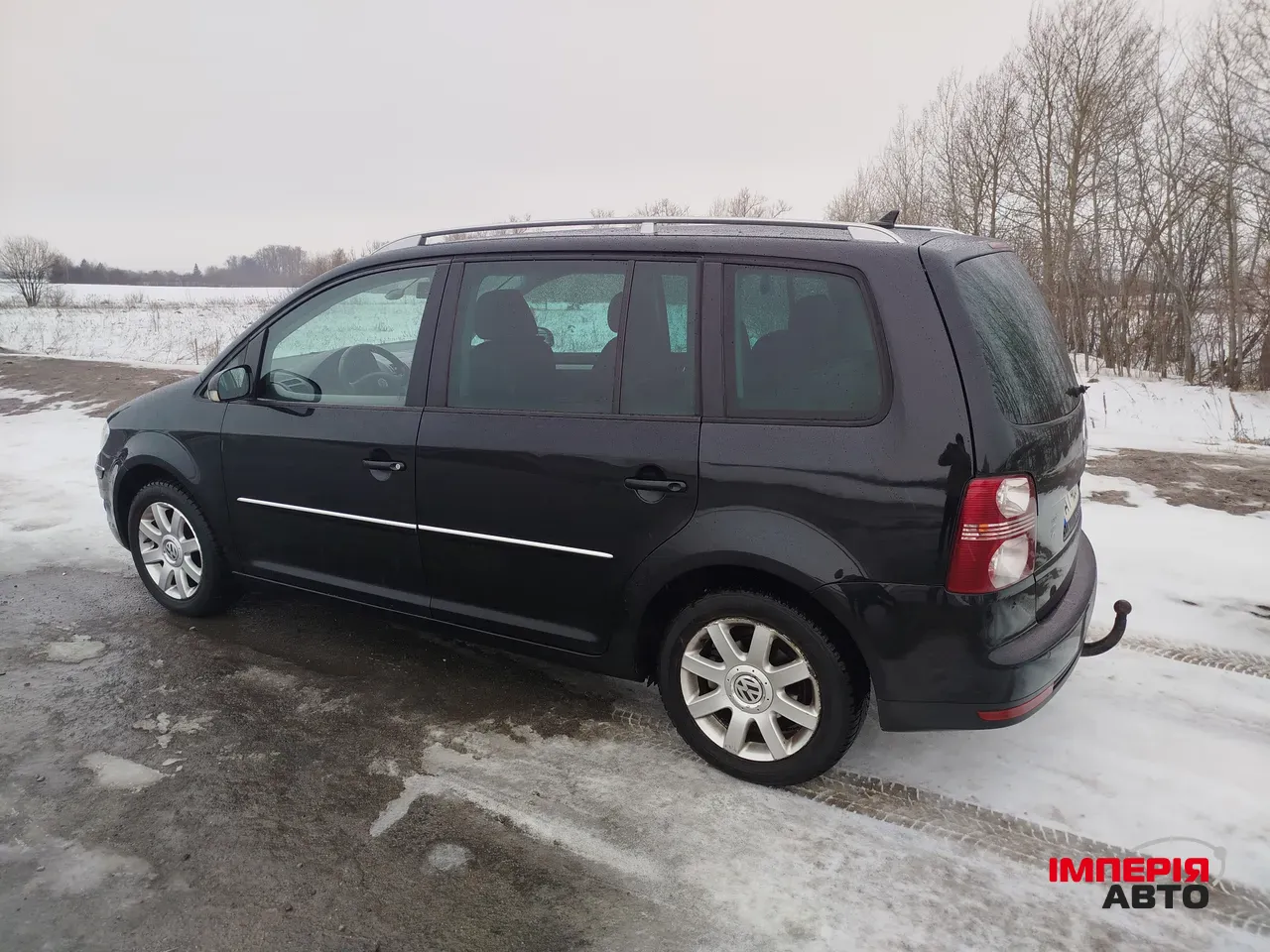 Volkswagen Touran - фото 5