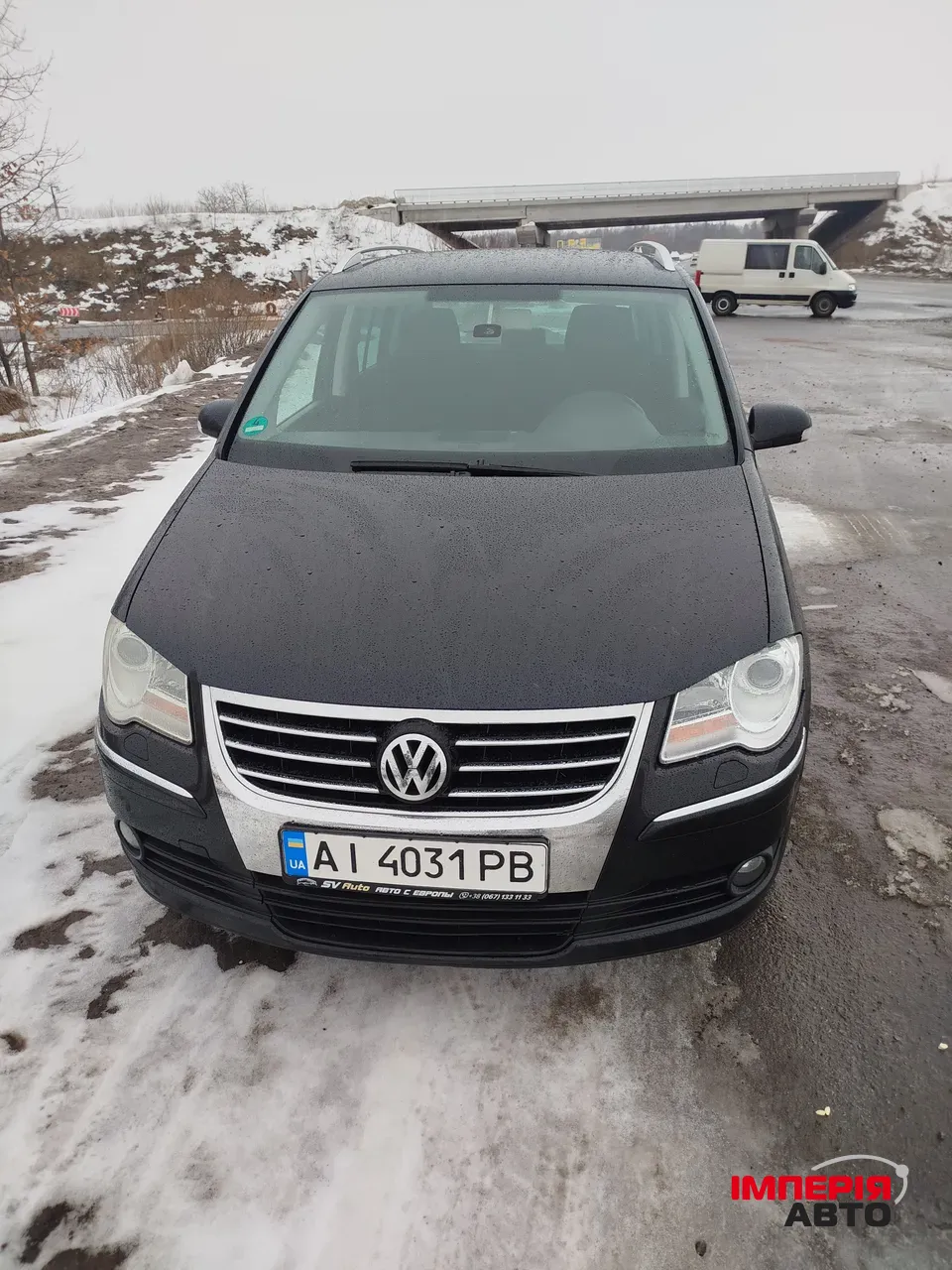 Volkswagen Touran - фото 7