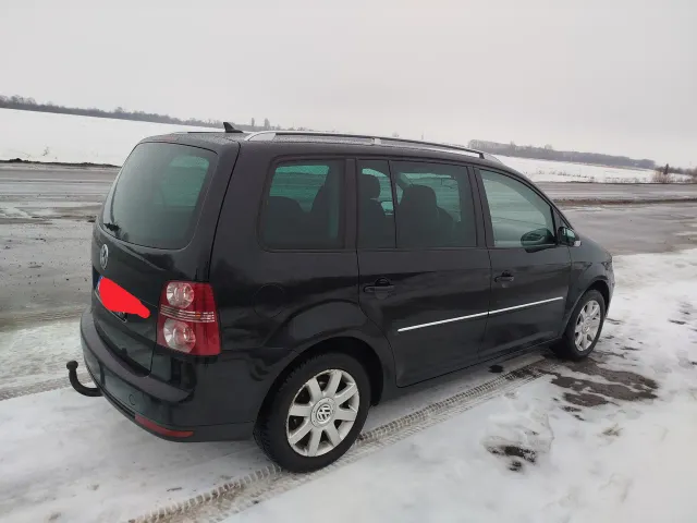 Volkswagen Touran - фото 3