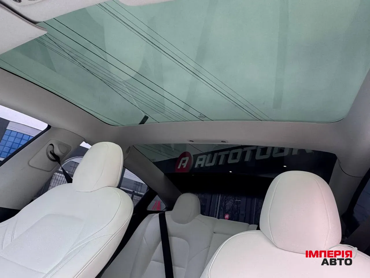 Tesla Model 3 - фото 8