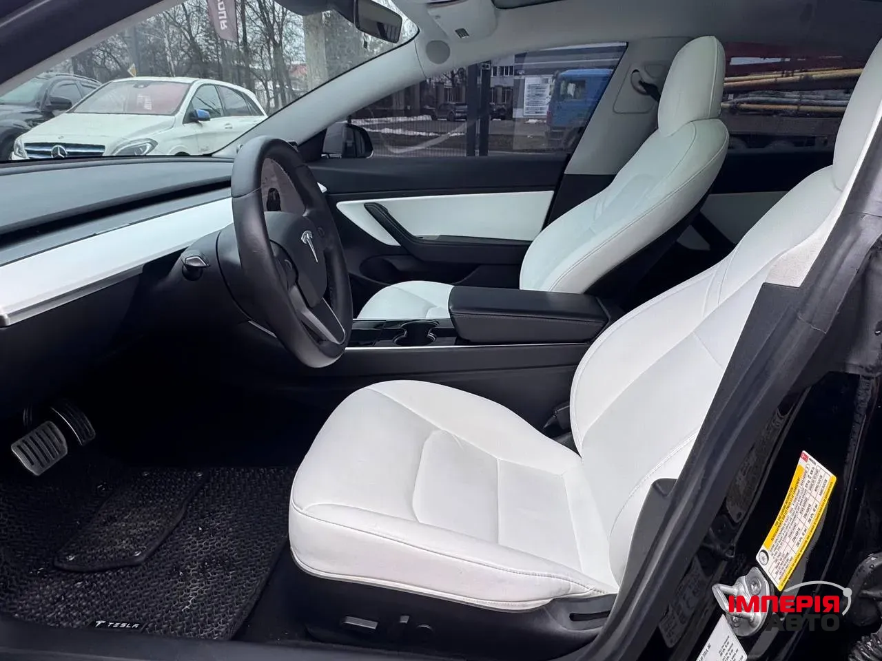 Tesla Model 3 - фото 4