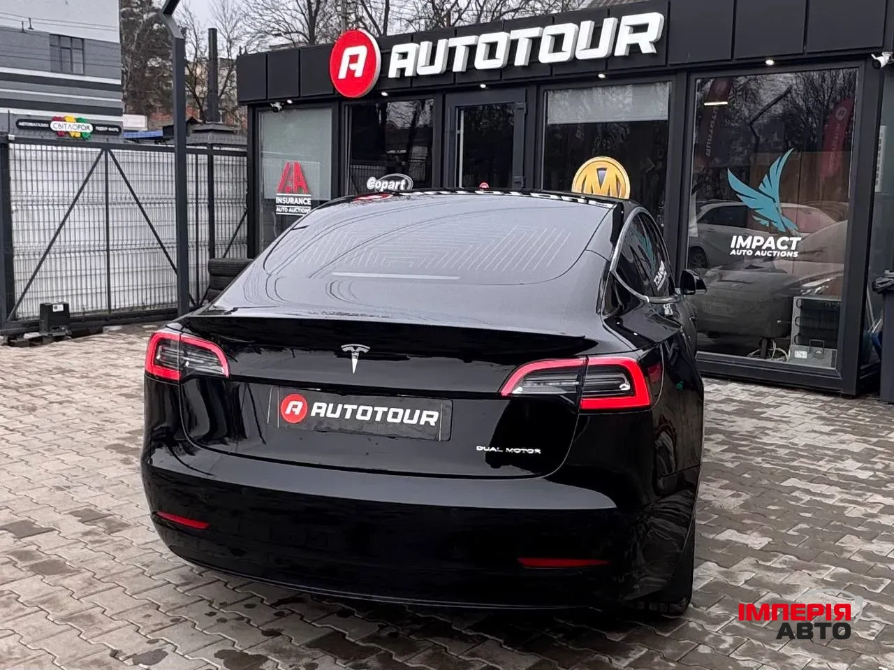 Tesla Model 3 - фото 10