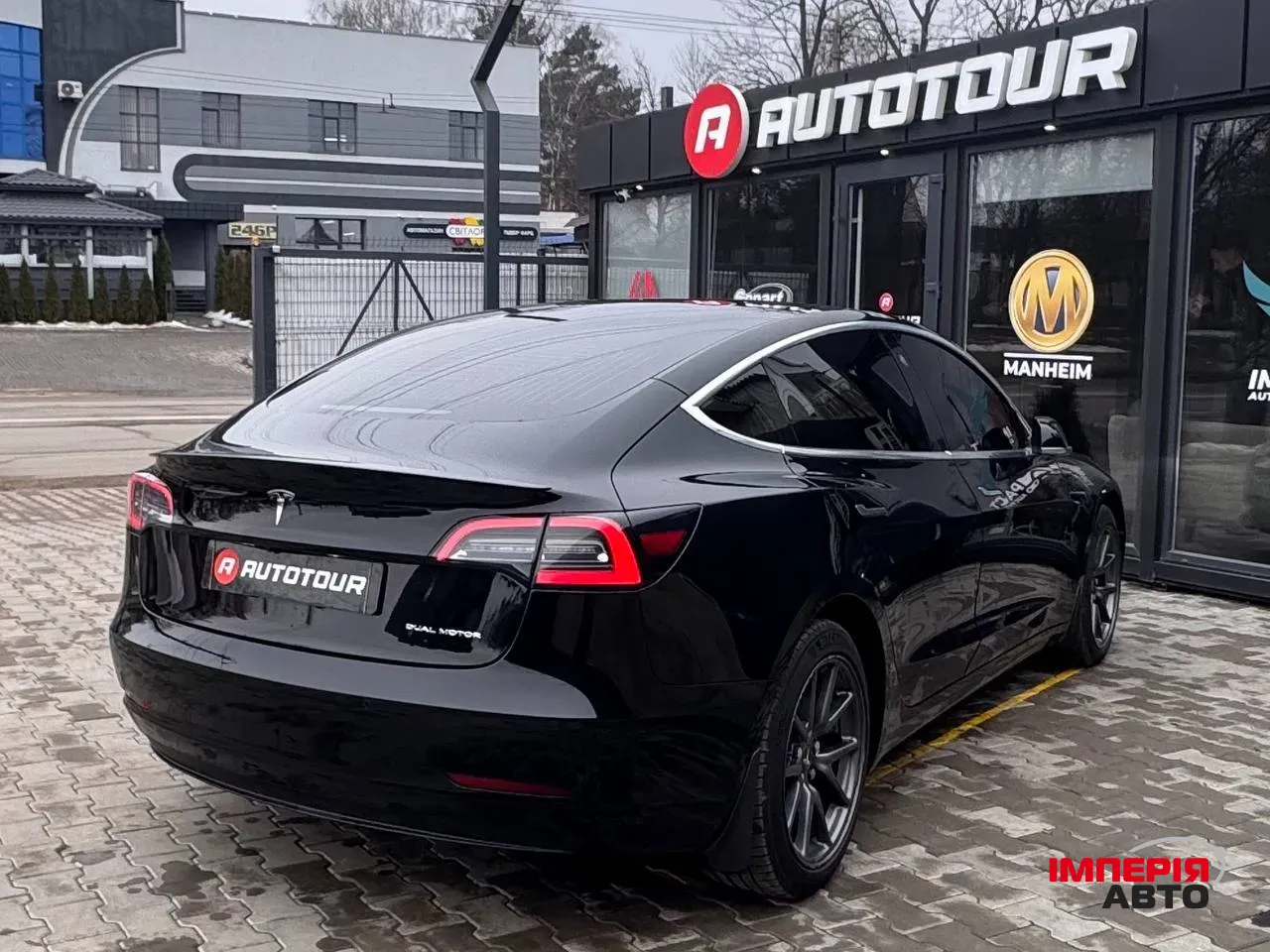 Tesla Model 3 - фото 11