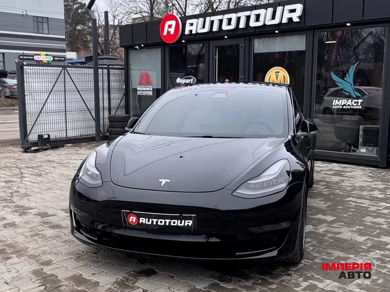 Tesla Model 3 - фото 1