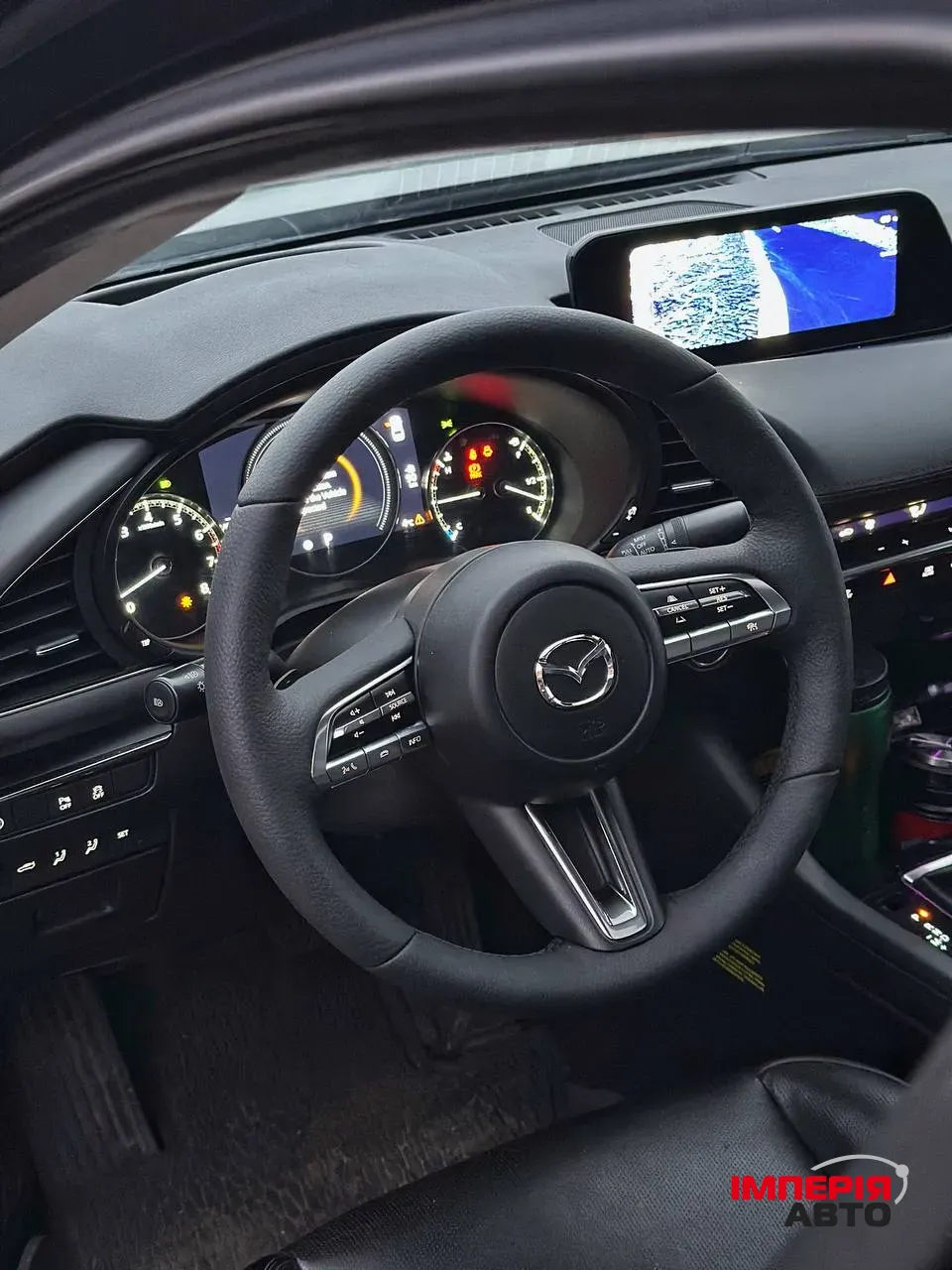 Mazda 3 - фото 12