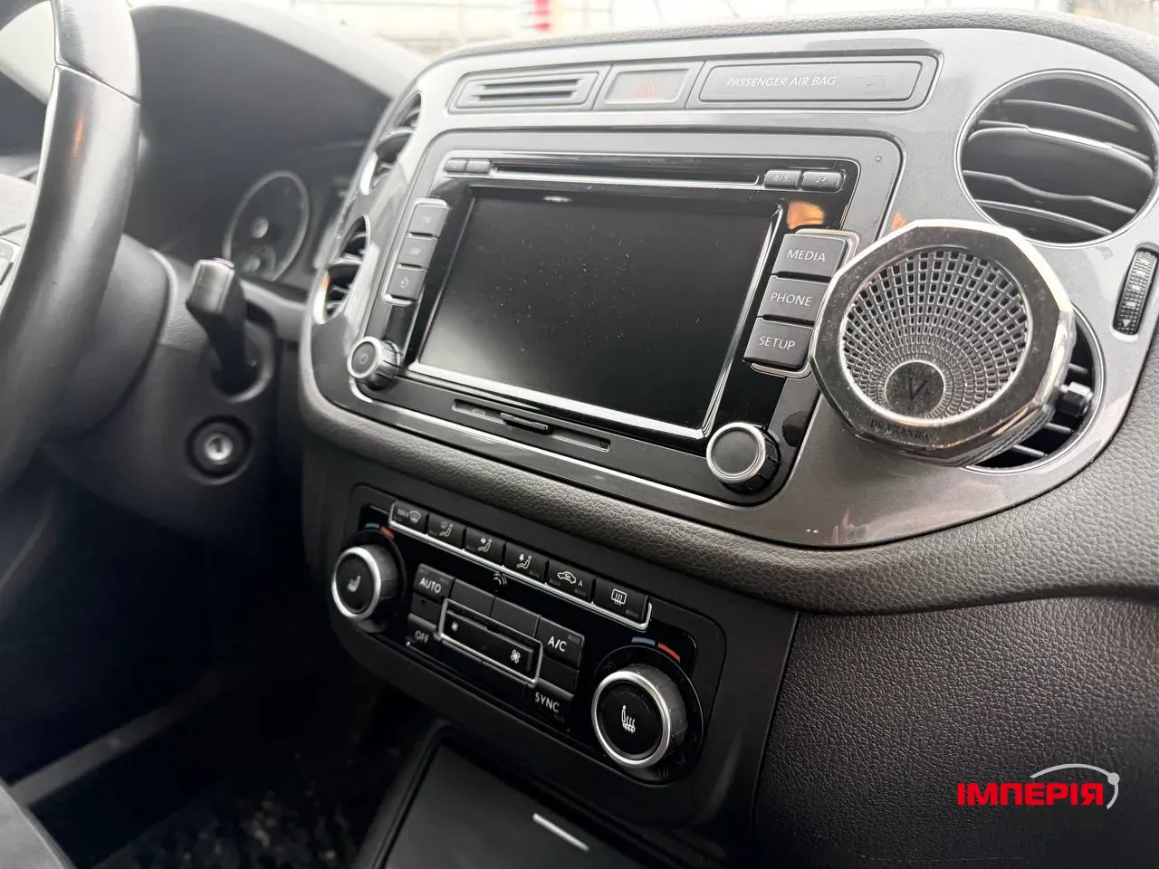 Volkswagen Tiguan - фото 14