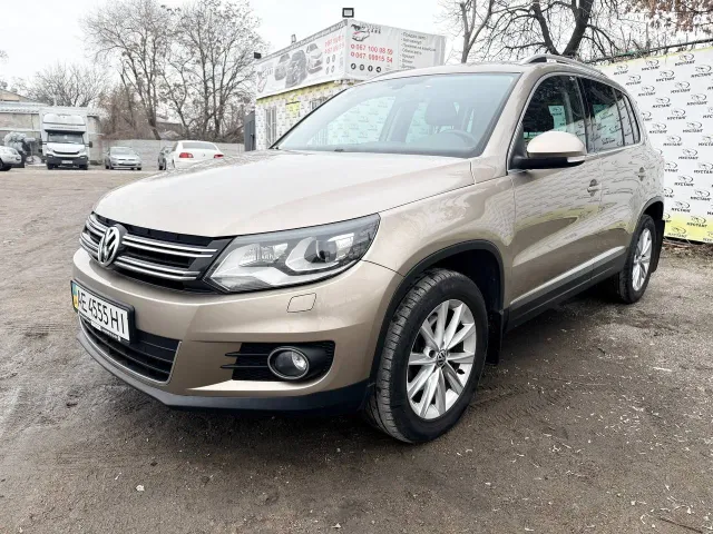Volkswagen Tiguan - фото 1