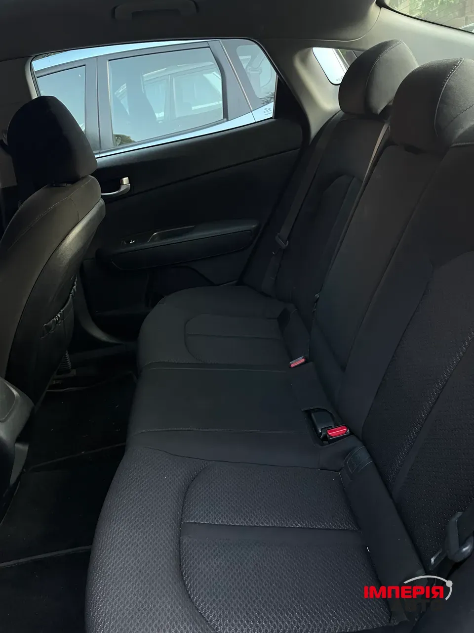 Kia Optima - фото 6