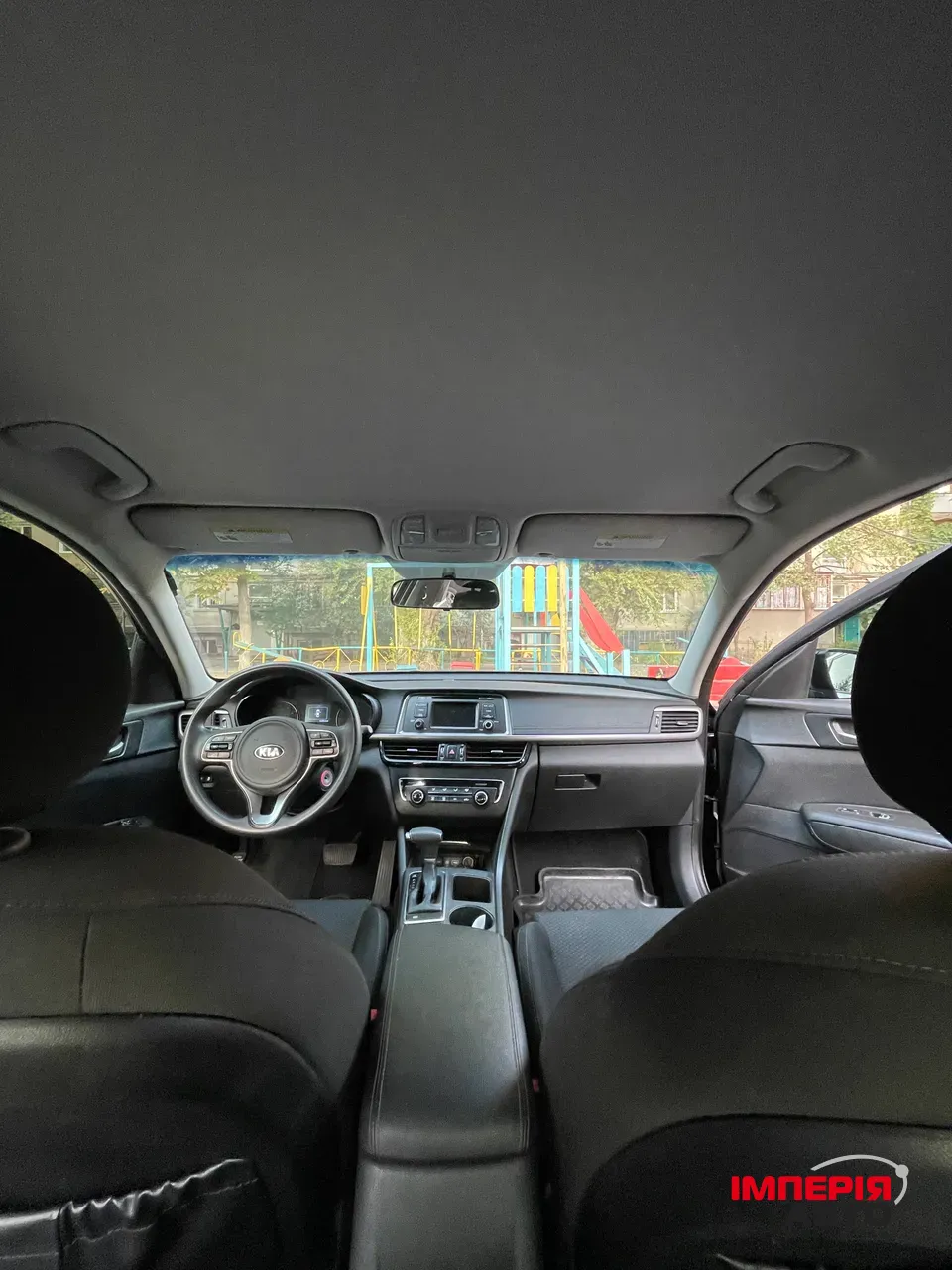 Kia Optima - фото 5