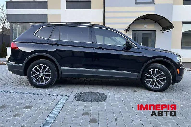 Volkswagen Tiguan - фото 5