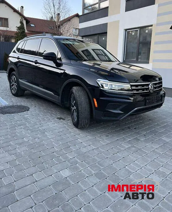 Volkswagen Tiguan - фото 1