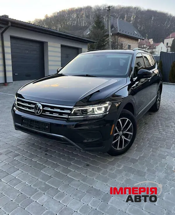 Volkswagen Tiguan - фото 2