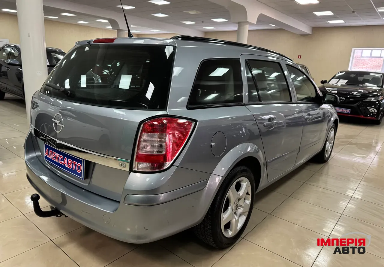 Opel Astra - фото 6