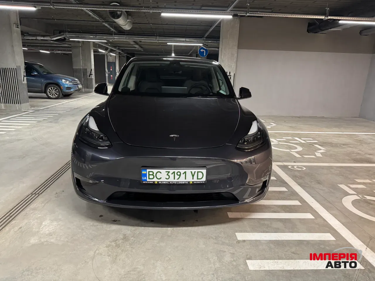 Tesla Model Y - фото 1