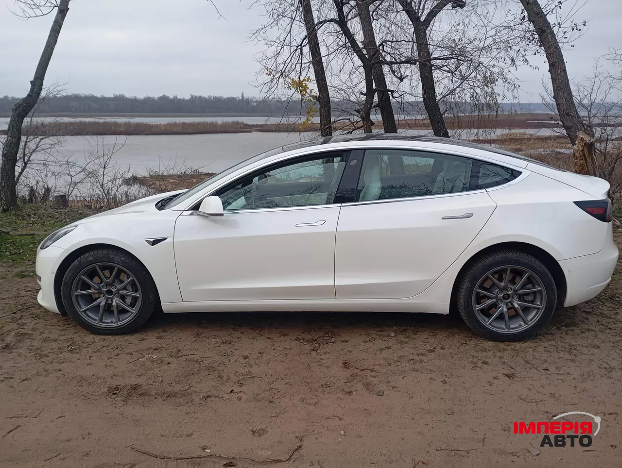 Tesla Model 3 - фото 11