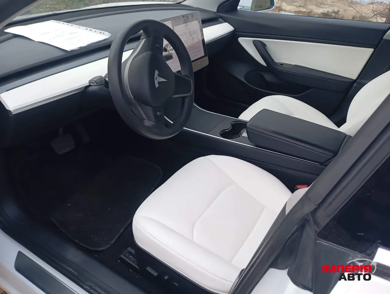 Tesla Model 3 - фото 12