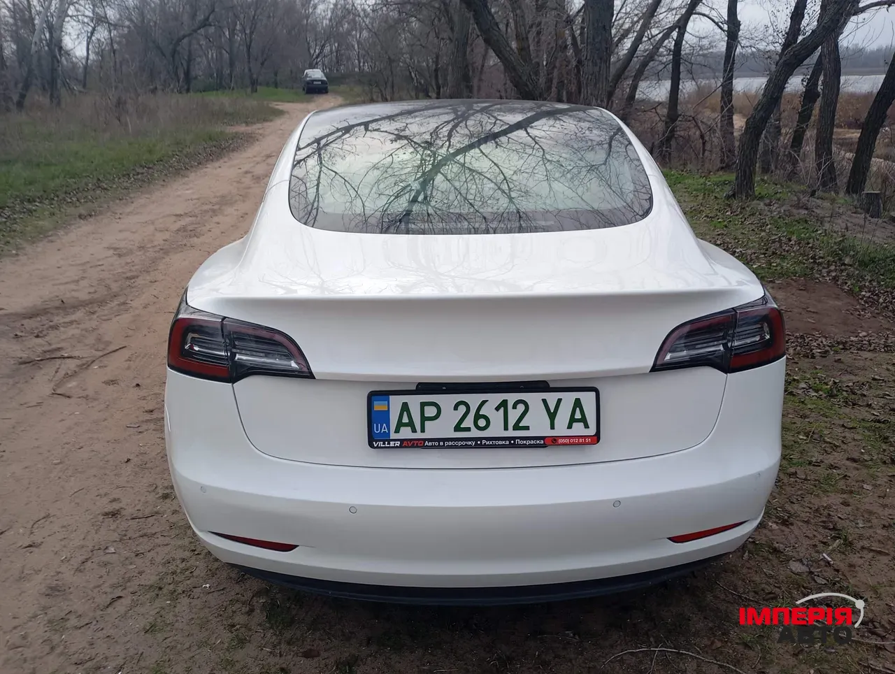 Tesla Model 3 - фото 9