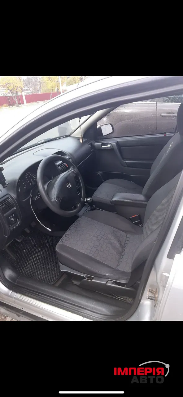 Opel Astra - фото 3