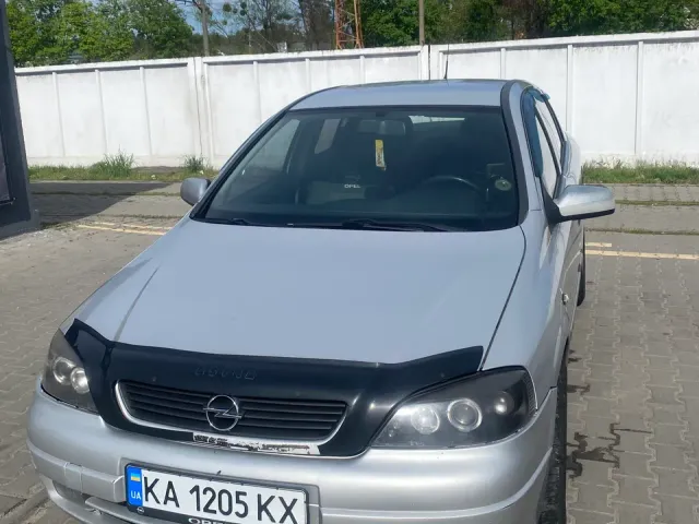 Opel Astra - фото 1