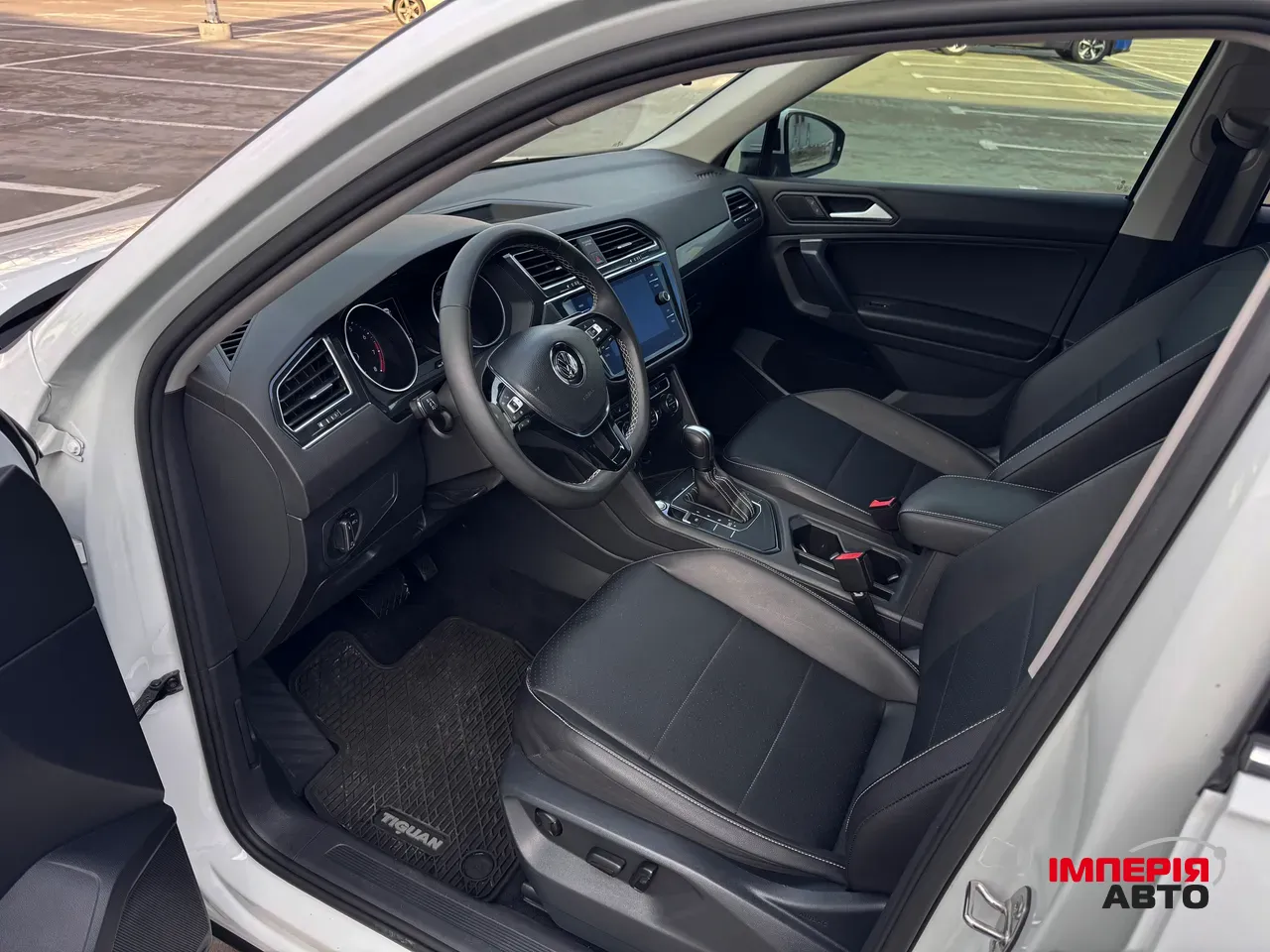 Volkswagen Tiguan - фото 11