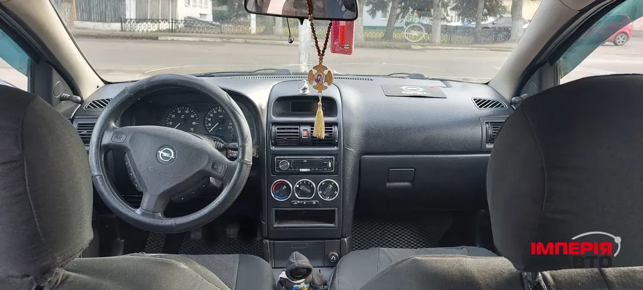 Opel Astra - фото 3