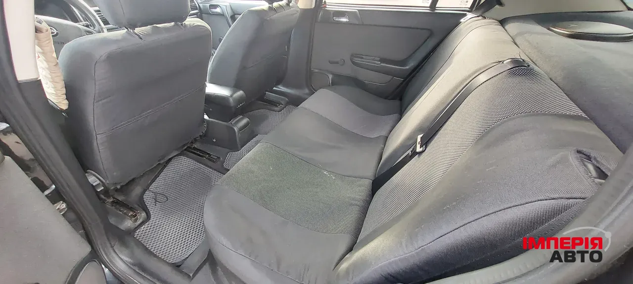 Opel Astra - фото 7