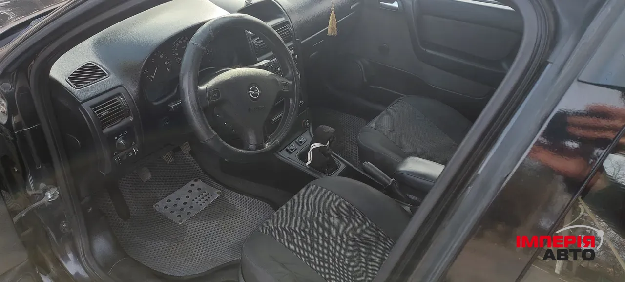 Opel Astra - фото 6