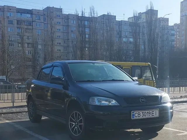 Opel Astra - фото 1