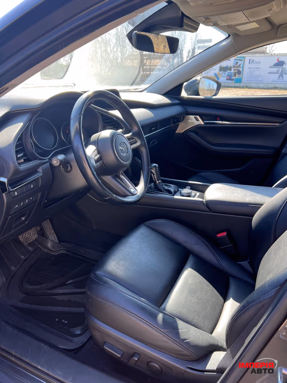 Mazda 3 - фото 6