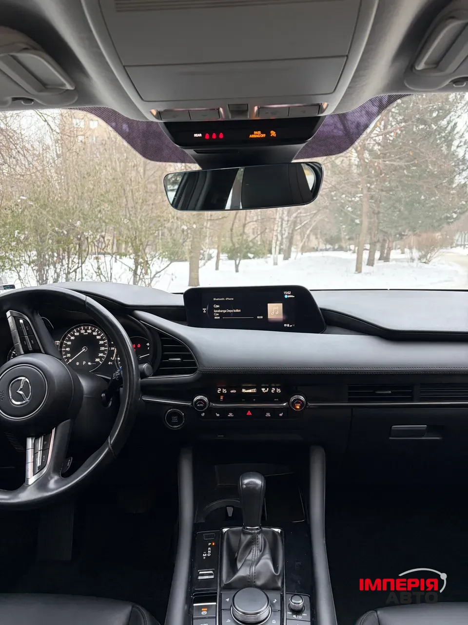 Mazda 3 - фото 8